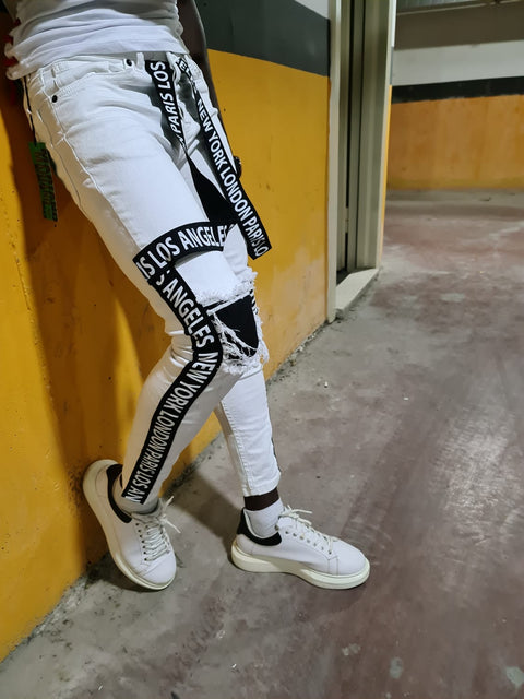 White Jeans With Black Strap With Distress